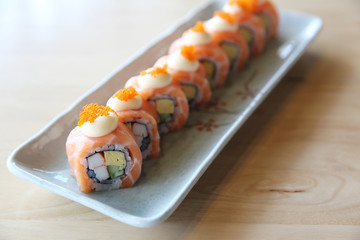 Japanese food Salmon roll on wood background