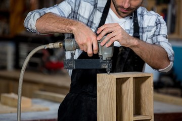 Carpenter working on his craft