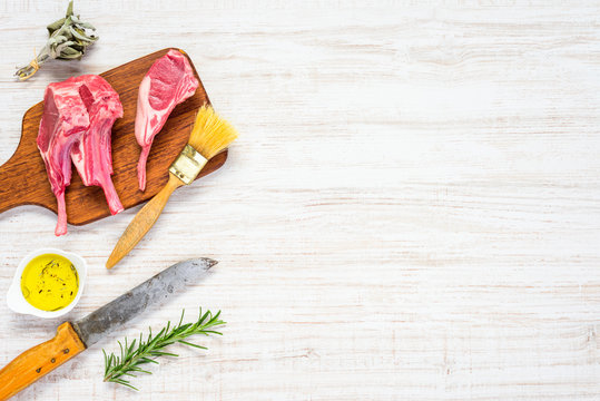 Lamb Chops, Butche Knife and Spices on Copy Space