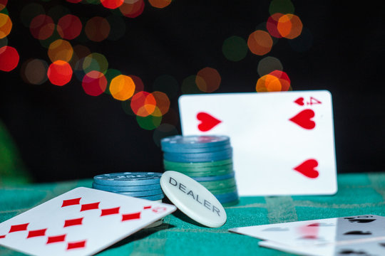 Blur background cards, chips in casino and few colors