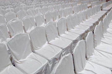 Fototapeta premium group White chair in big room