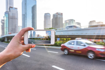Shenzhen street view with cityscape in background.
