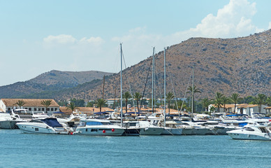 Fototapeta na wymiar Many yachts and boats in the harbor.