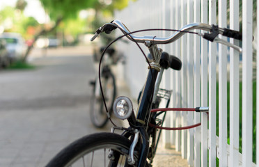 Fototapeta na wymiar Bicycle locked up on the street .