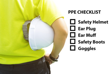 Hazard Identification and Risk Assessment concept (Safety work place) - Engineering man or Safety Inspector standing with PPE checklist.