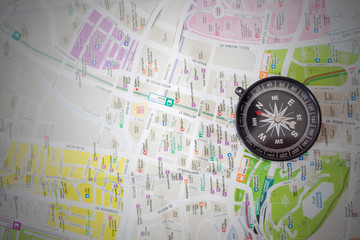 compass on the tourist map. Focus on the compass needle