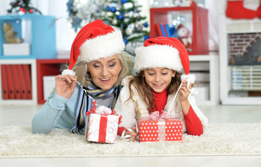 Grandmother and child with gift