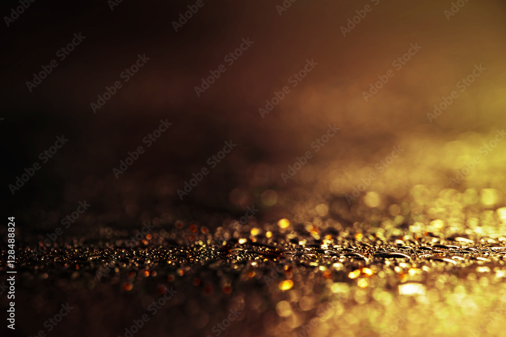 Aufkleber abstract golden background with shiny brilliant water drops, dew or rain on the glass with round bok