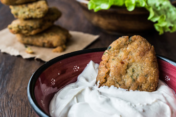 Chickpeas Falafel with sauce and parlsey.