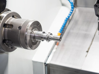 machining automotive part by cnc turning machine