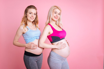 Healthy young mummies with baby bellies