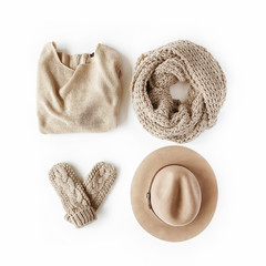 beauty feminine clothes arrangement with hat, mittens, sweater, scarf. flat lay, top view