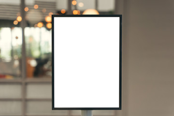 Blank sign with copy space for your text message or mock up content in modern shopping mall.
