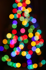  Unfocused Christmas tree with colorful lights