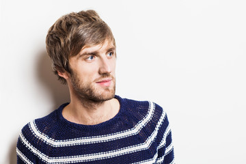 Handsome young man studio portrait