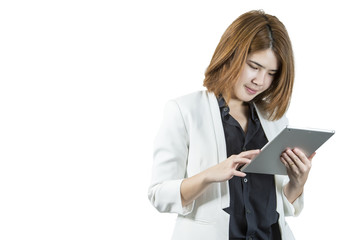 Fototapeta premium Business woman holding a tablet computer - isolated over a white background
