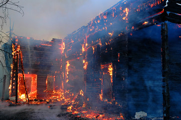 Firefighters extinguish a house