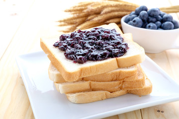 slice of bread with jam blueberry