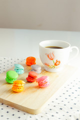 Colorful macaroons with Black coffee