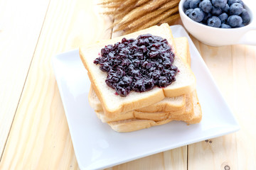 slice of bread with jam blueberry