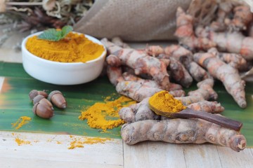 Turmeric powder and fresh root is herb.