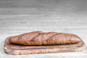 Bread is on grey wooden background