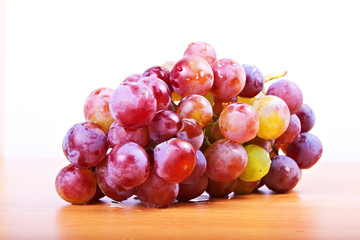 red grapes with white background