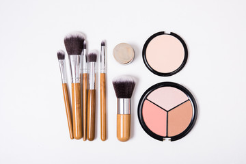 Professional makeup tools, flatlay on white background