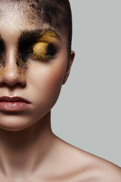 Half Face of fashion beauty Model with Makeup