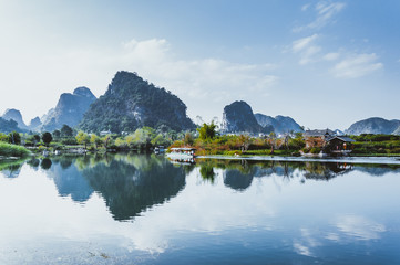 The karst mountains and river scenery in the evening 