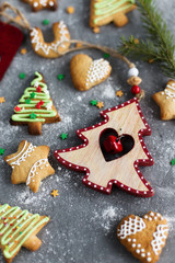 Christmas cookie and Christmas decorations on a gray background