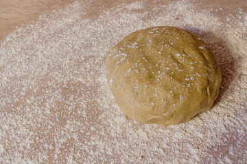 Ball of dough  with dusting of flour