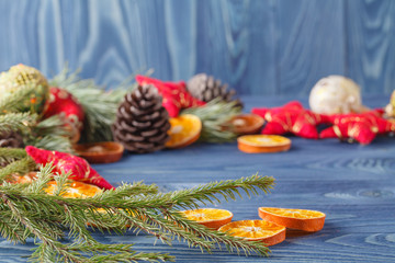 Bright beautiful blue Christmas background with branches of fir