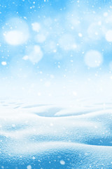 Winter background. Winter bright landscape with snowdrifts and falling snow.
