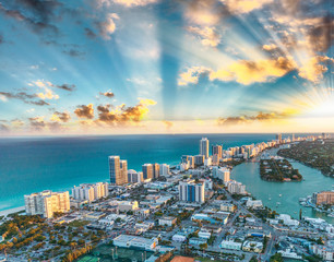 Miami Beach buildings and canals, aerial sunset view