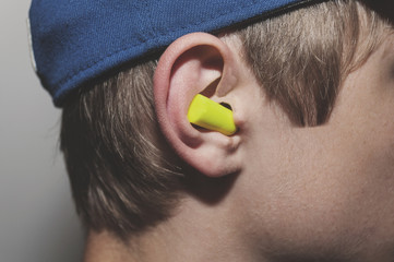 Yellow Foam Ear Plugs In Ear