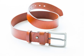 Men's leather brown belt on white background