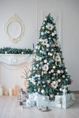 Decorated Christmas tree on blurred, sparkling and fairy backgro