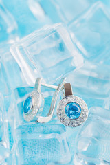 Luxury earrings with zircon and blue gemstones