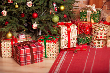 Christmas gifts under the tree. New Year home interior