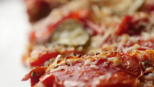 Triticum spelta made tasty Italian food with vegetables 4K 2160p 30fps UltraHD footage - Slow tilt over dinkel or hulled wheat gluten-free vegetarian pizza surface 3840X2160 UHD tilting video 