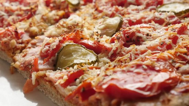 Tasty Italian food with Triticum spelta and with vegetables 4K 2160p 30fps UltraHD footage - Slow tilt over dinkel or hulled wheat gluten-free vegetarian made pizza surface 3840X2160 UHD tilting video