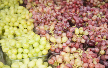 Grape. Wine grapes background. Grapes an market. It can be used as a food background (selective focus)