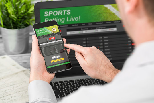 betting bet sport phone gamble laptop concept