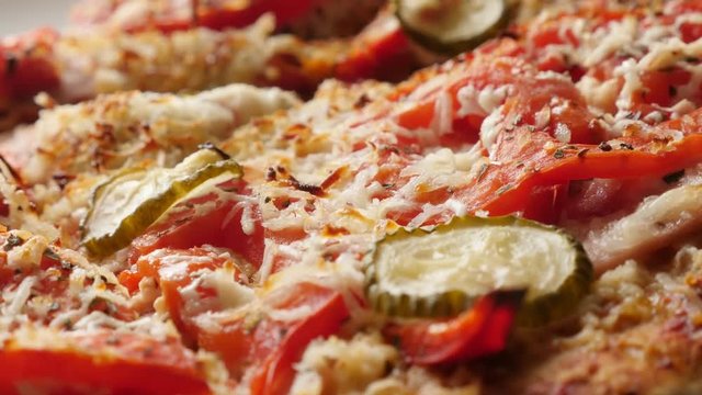 Italian food with Triticum spelta with vegetables 4K 2160p 30fps UltraHD footage - Slow tilt over dinkel or hulled wheat gluten-free vegetarian made pizza surface 3840X2160 UHD tilting video 