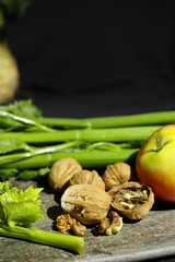 Ingredients for Waldorf salad -  celery, apples, walnuts 