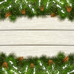 Fototapeta na wymiar White wooden background with Christmas fir tree branches and sno