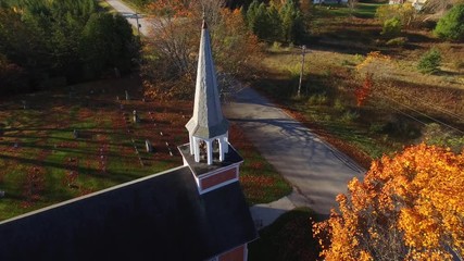 Beautiful little rural church and cemetery amid Autumn colors.
