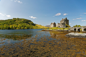 Fototapeta na wymiar Eilean Donan Castle located in Scotland, UK, beautiful weather