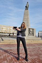 The woman in the city of Lodz - obrazy, fototapety, plakaty